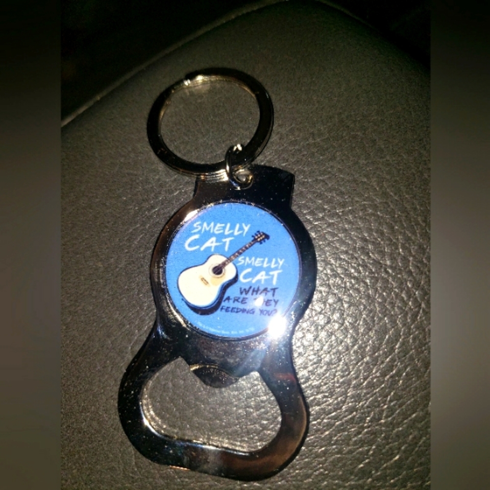 "SMELLY CAT, SMELLY CAT WHAT ARE THEY FEEDING YOU" BOTTLE OPENER KEY CHAIN. NWOT